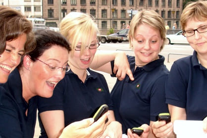 Team of employees with GPS receivers at a Hamburg rally