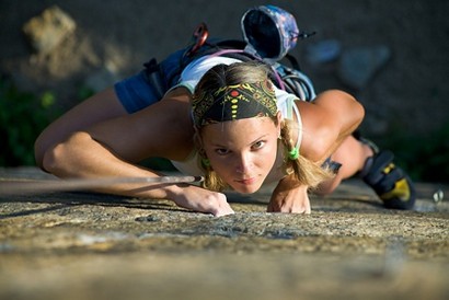 Employee climbing on the rock face