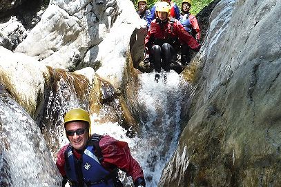 Employees on a canyoning tour in Tuscany Employees on a canyoning tour in Tuscany