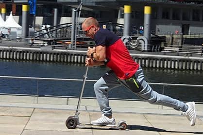 Kickboard race in Hamburg's harbour city Employee at the kickboard race in Hamburg's harbour city