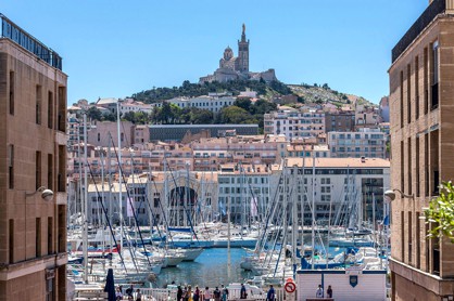 Incentive destination Marseille with it`s harbor and Notre Dame de la Garde de la Garde