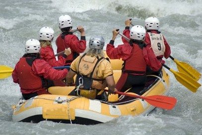 Employee team rafting in Slovenia