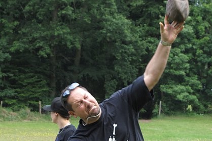 Employee throwing stones during a team event