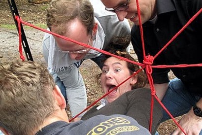 Team building during a management event while traversing the so-called "spider's web"