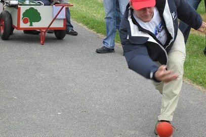 Employee taking part in an outdoor bowling competition